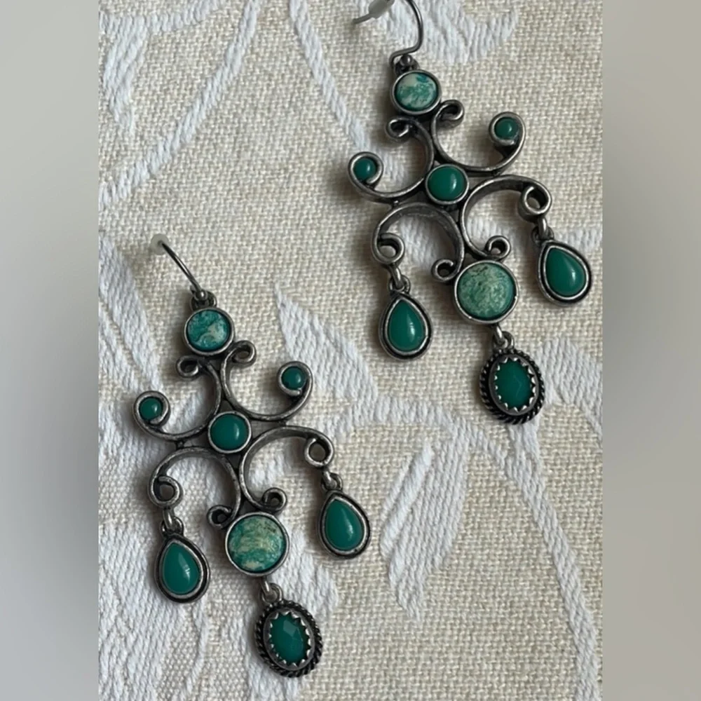 Silver and Green Dangle Earrings with Intricate Design